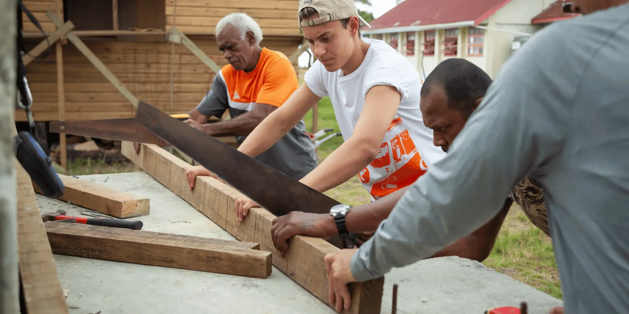 Group of people building their community in Fiji