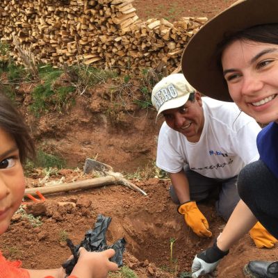 Young members helping our reforestation planting project in Peru